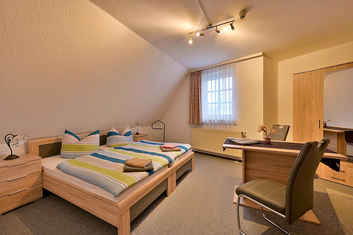 Blick in ein Dreibettzimmer