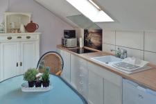 Küchenbereich inkl. Esstisch