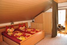 Schlafbereich mit Doppelbett