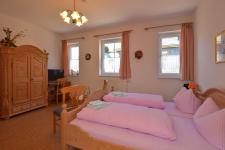 Blick in ein Dreibettzimmer