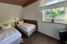 Familienappartement - Schlafzimmer mit 2 Einzelbetten