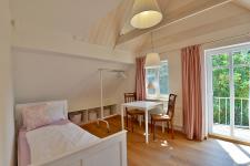 Schlafzimmer mit getrennten Betten