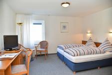 Blick in ein Dreibettzimmer